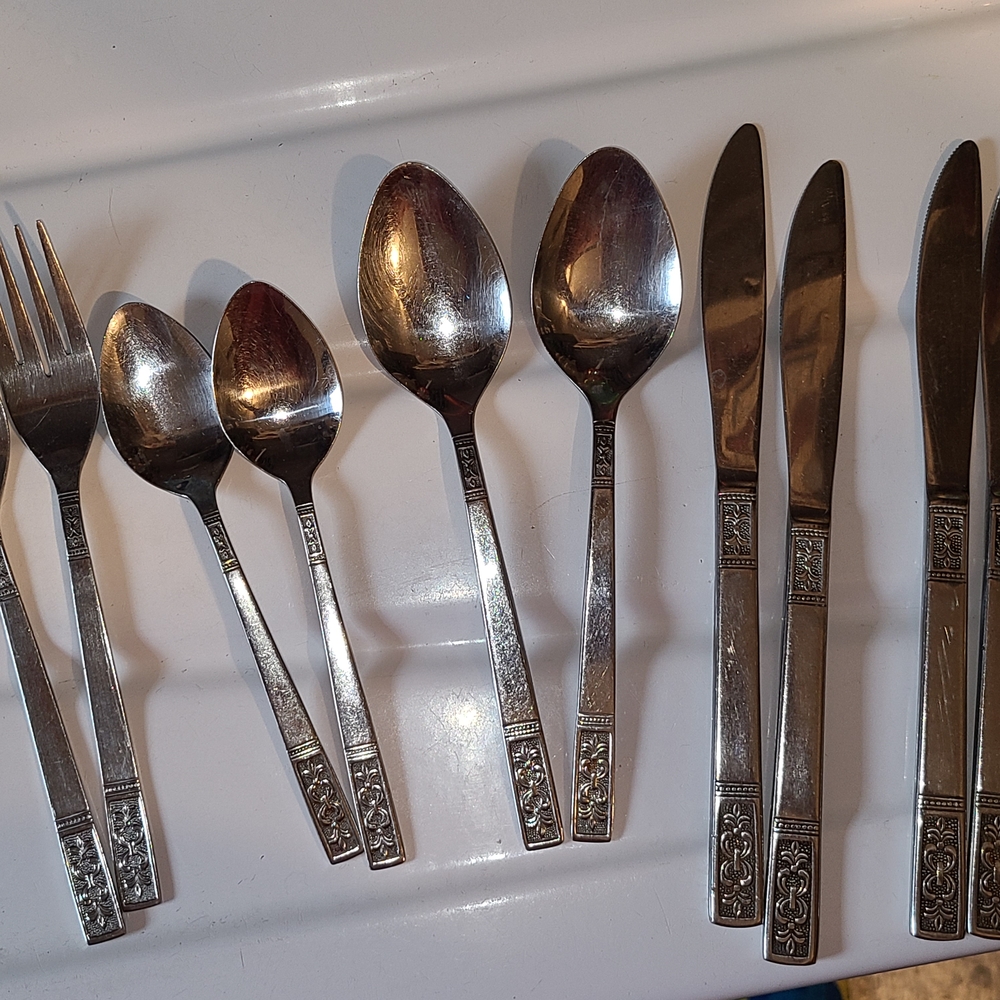 Silver Flatware Set with Decorative Handles